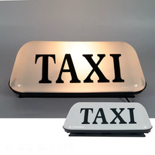 Naložite sliko v pregledovalnik galerije, Oznaka TAXI na strehi
