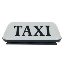 Naložite sliko v pregledovalnik galerije, Oznaka TAXI na strehi

